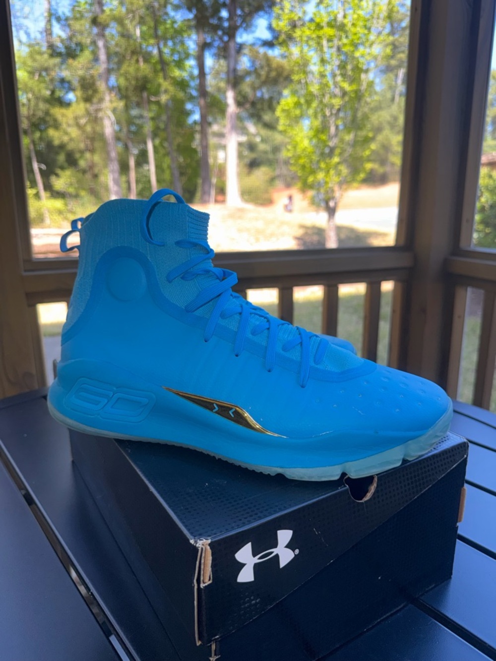 Under Armour Curry 4 Retro basketball sneakers in the 'Flooded' Capri colorway